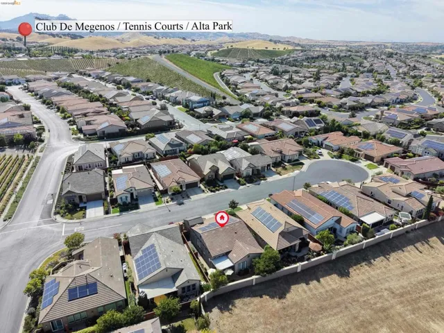 Aerial perspective showcasing a residential neighborhood with numerous single-family homes