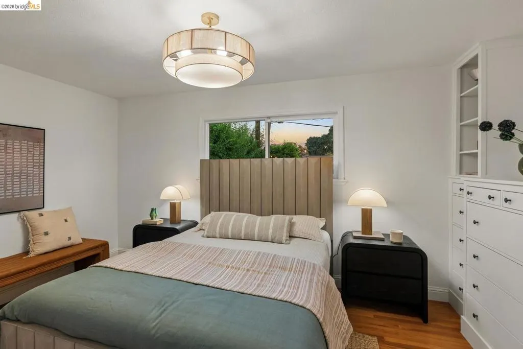 White walls complement the wood-finish flooring