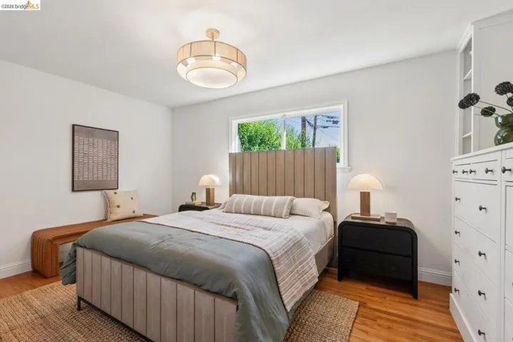 Hardwood flooring complemented by white baseboards