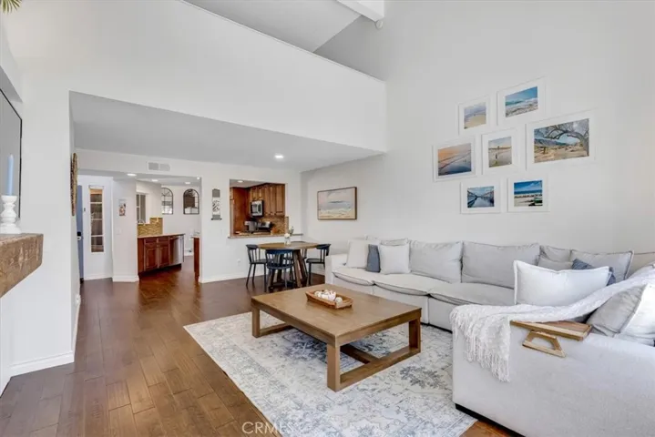 The kitchen opens into the dining & living rooms.