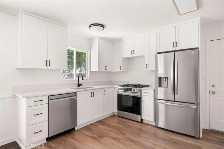 Appliances are AI generated into this photo.