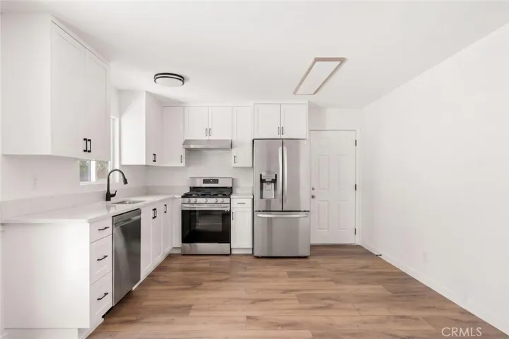 Appliances are AI generated into this photo.
