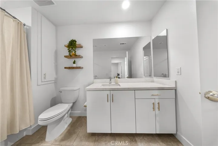 Second bathroom with tub and shower
