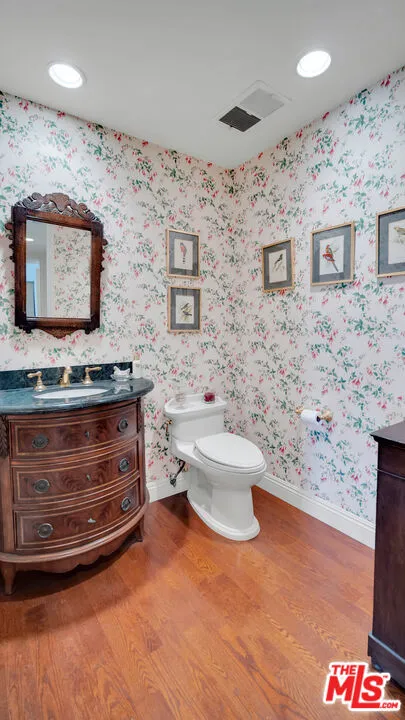 Charming powder room featuring