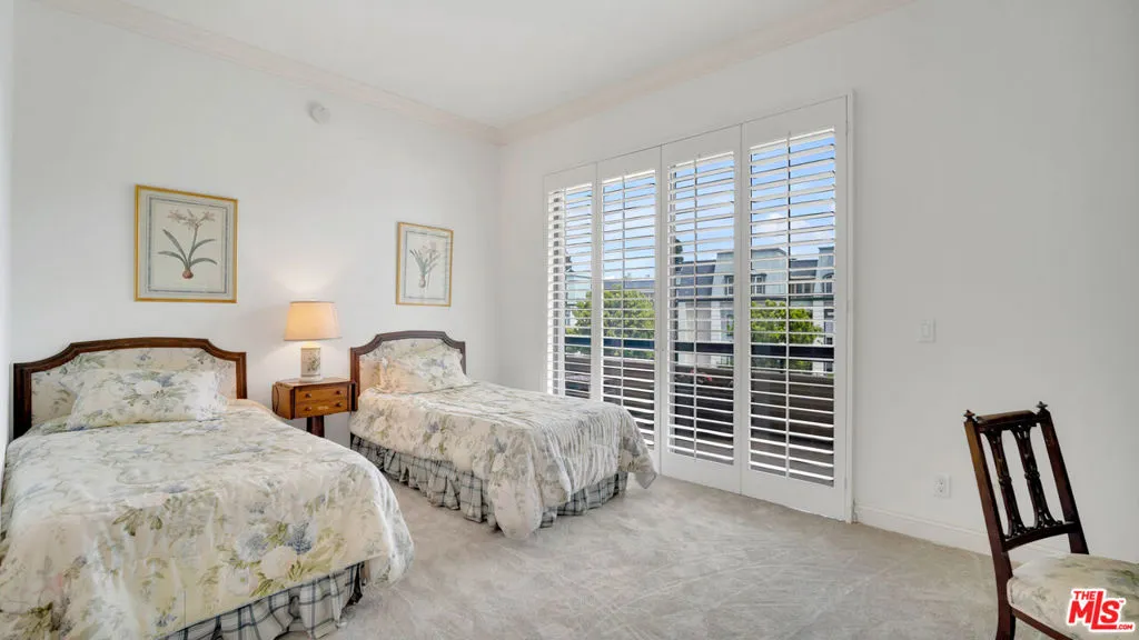 Bright secondary bedroom featu
