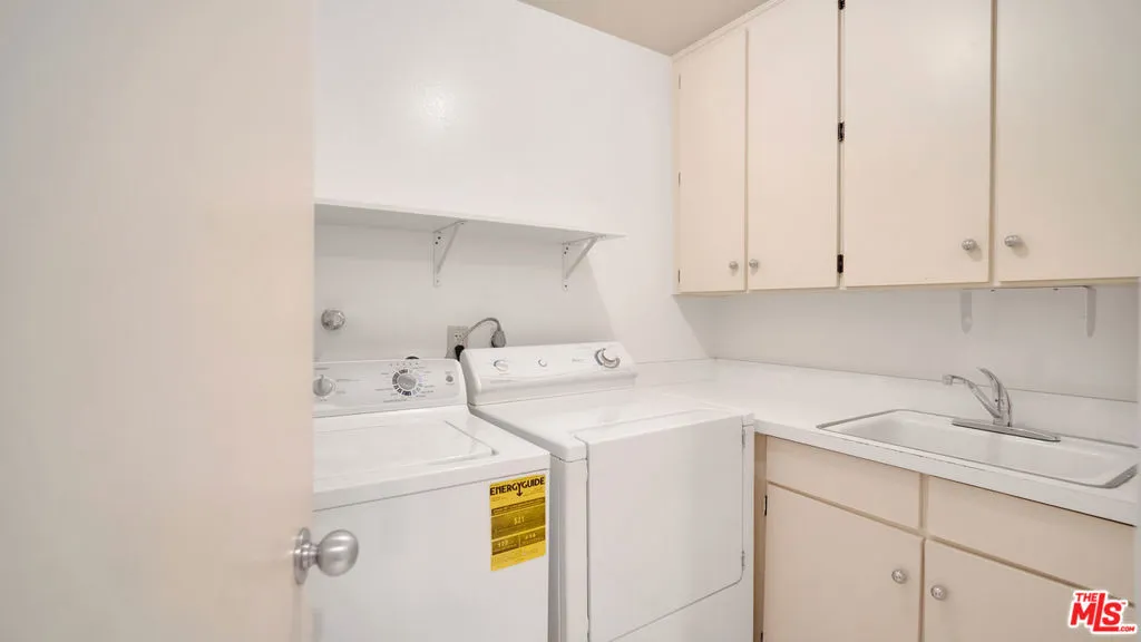 Dedicated laundry room with ad
