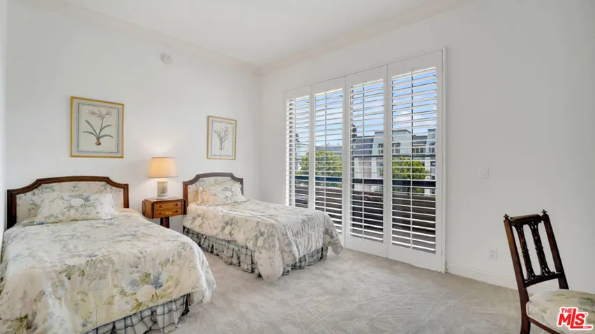 Bright secondary bedroom featu
