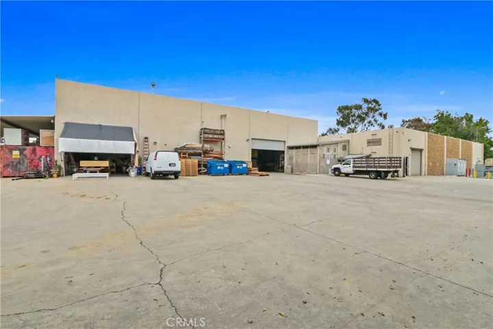Back of building, gated parking