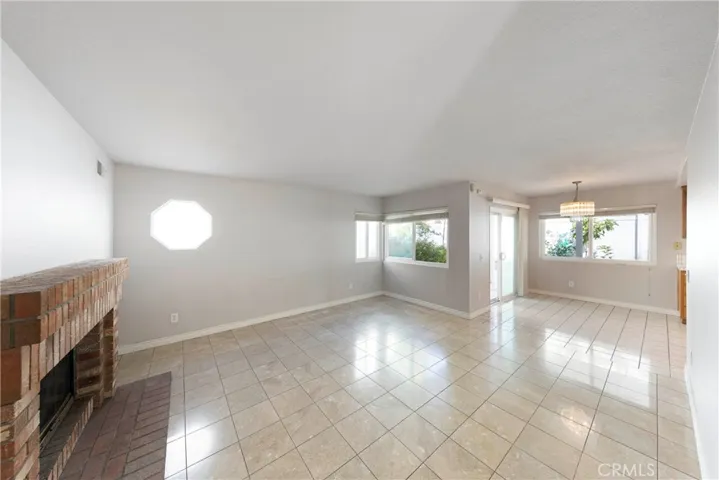 Family room easily pours into breakfast area, kitchen, and easily accessible to backyard.