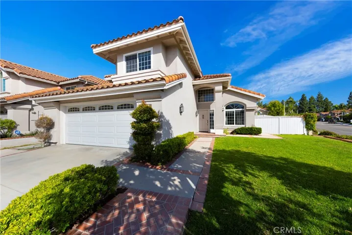 Private entrance with beautiful front yard space.
