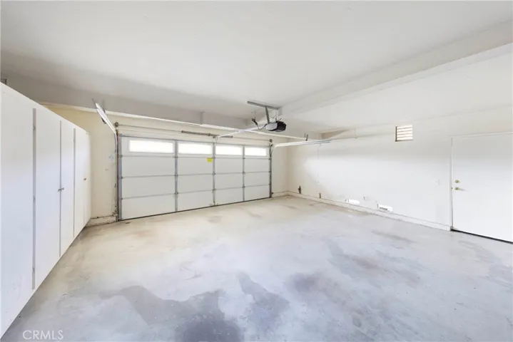 2-Car garage with built in storage.