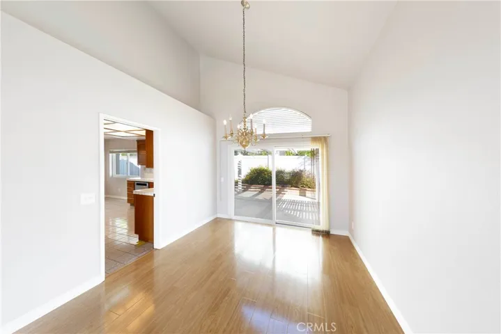 Formal Dining area offering convenient access to both the kitchen and back patio.
