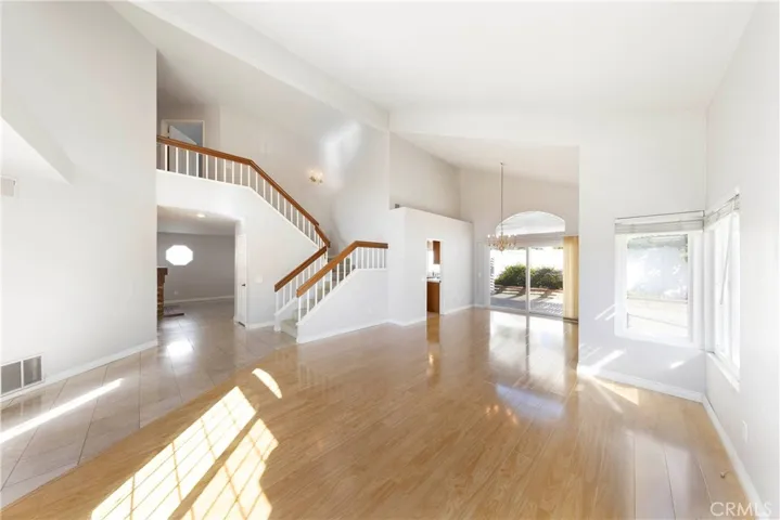 Expansive living room with cathedral ceilings.