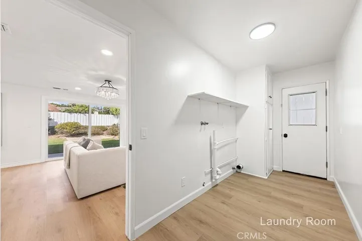 laundry area next to family room