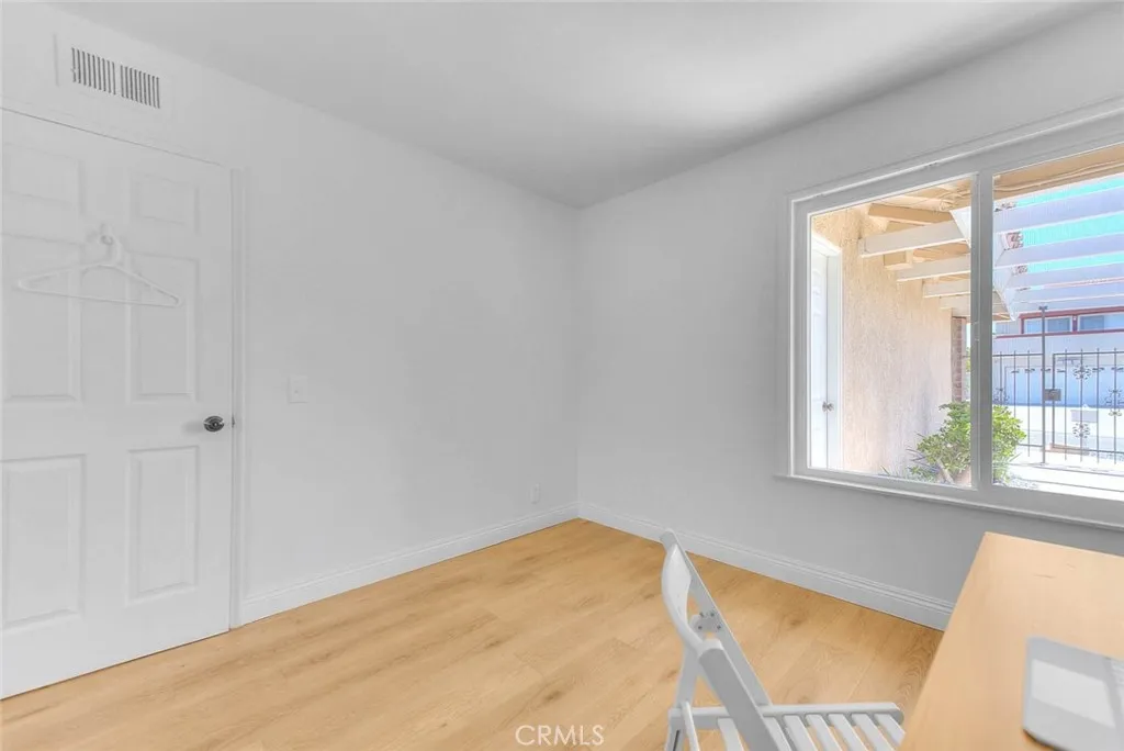 Secondary bedroom with courtyard view