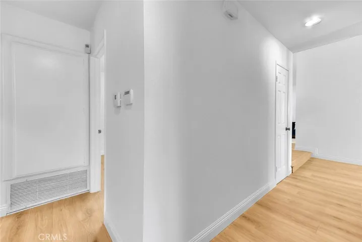 Hallway from the family room is to the right