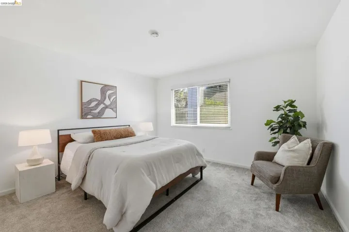 Room featuring light gray carpet flooring and white walls