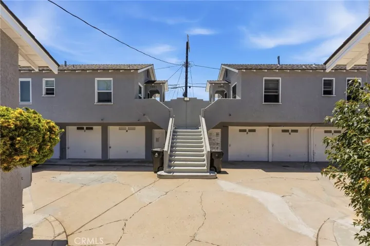 2 units above 8 single car garages