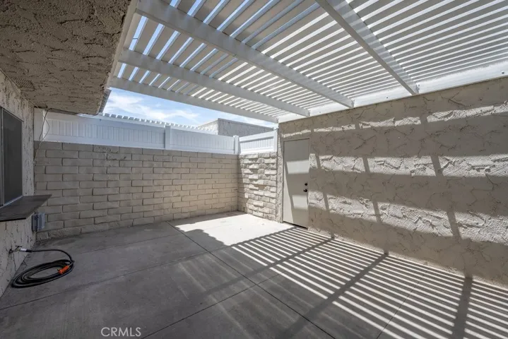Quartyard / Patio with access to garage