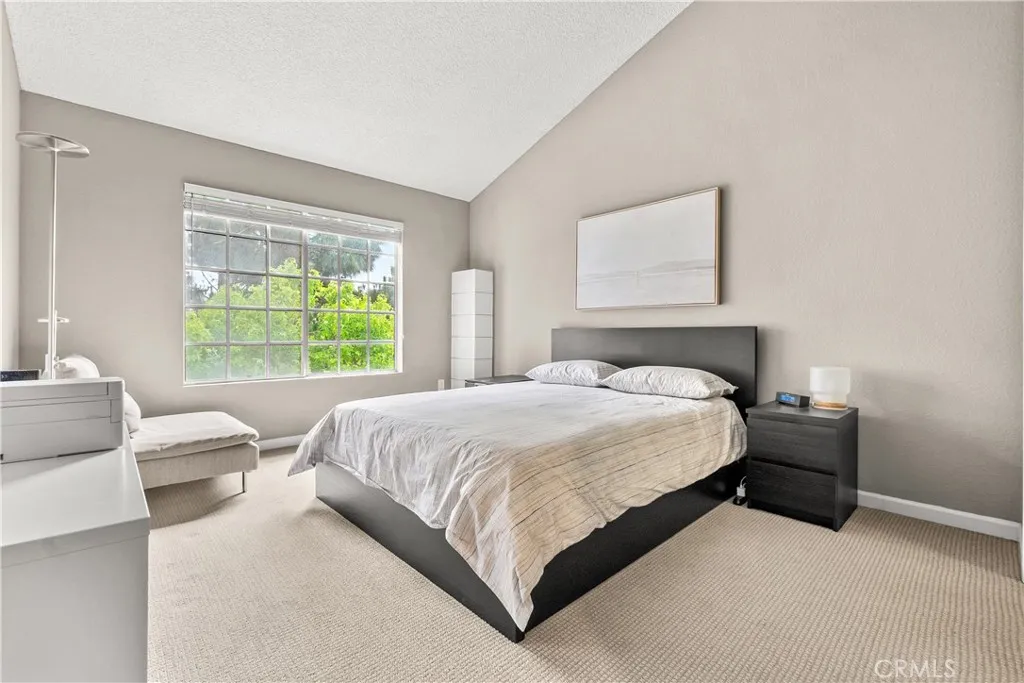 Primary suite overlooking trees