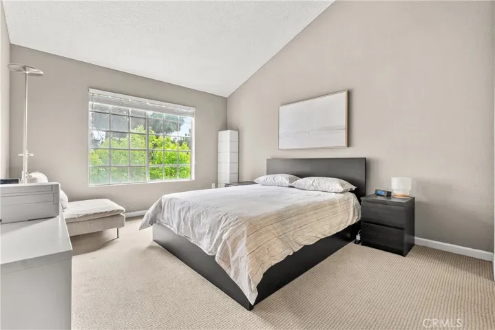 Primary suite overlooking trees