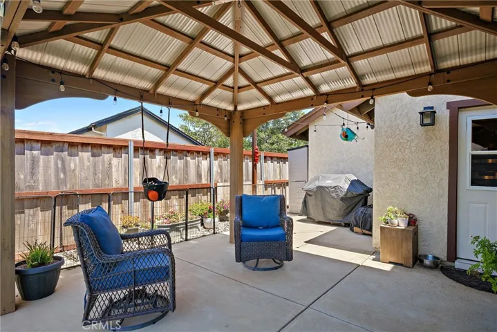 Linai patio space off Kitchen and downstairs bedroom #1.