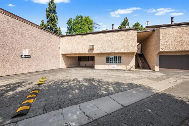 Building right of the carport is your laundry room