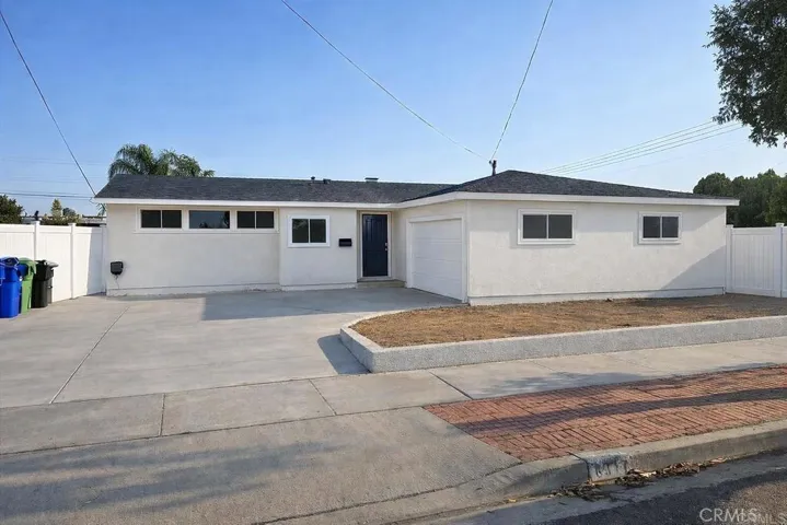 Garage and large driveway with all new roofing