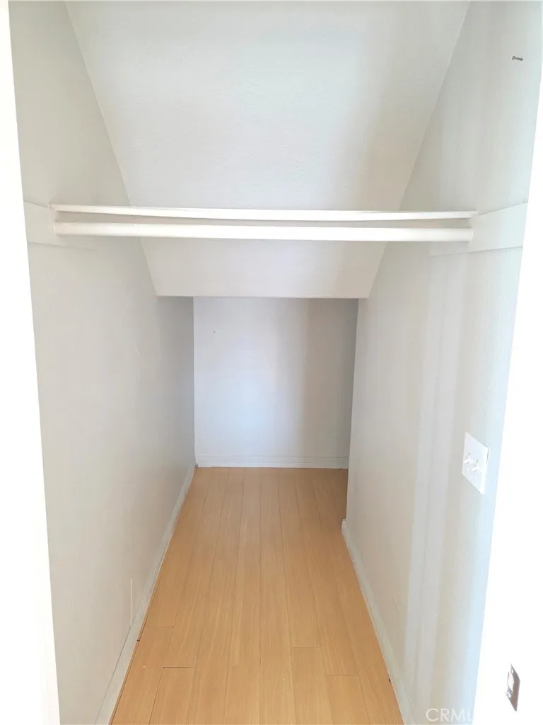 Under staircase storage/coat closet