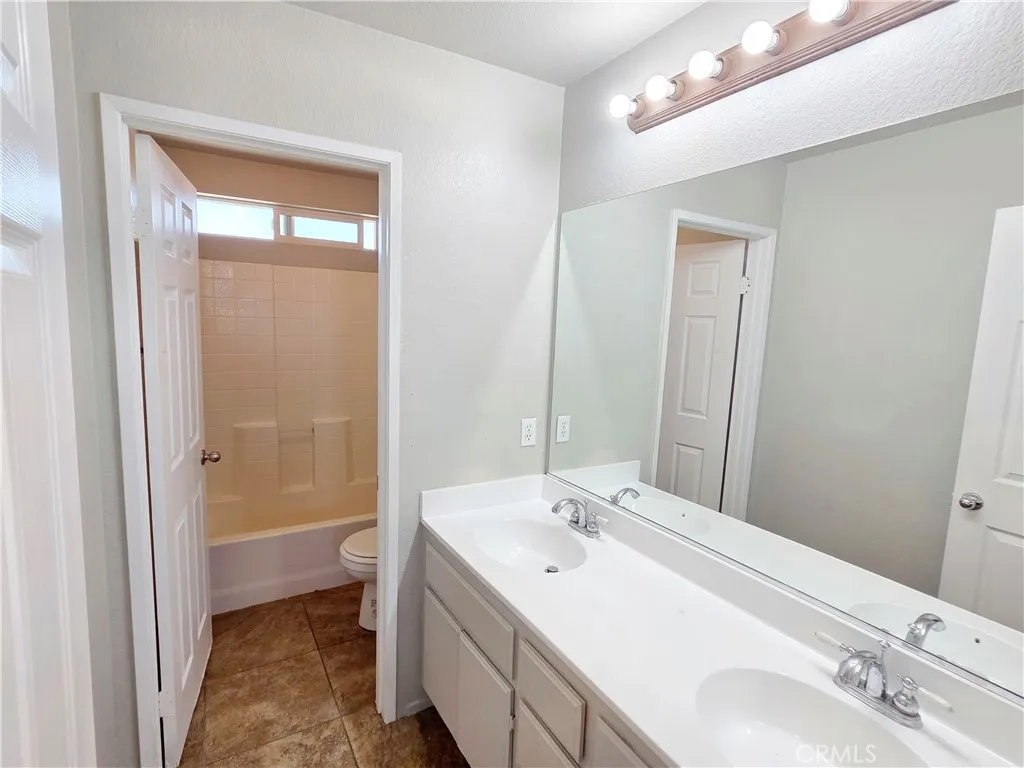 Bathroom 2 with Dual Sink Vanities