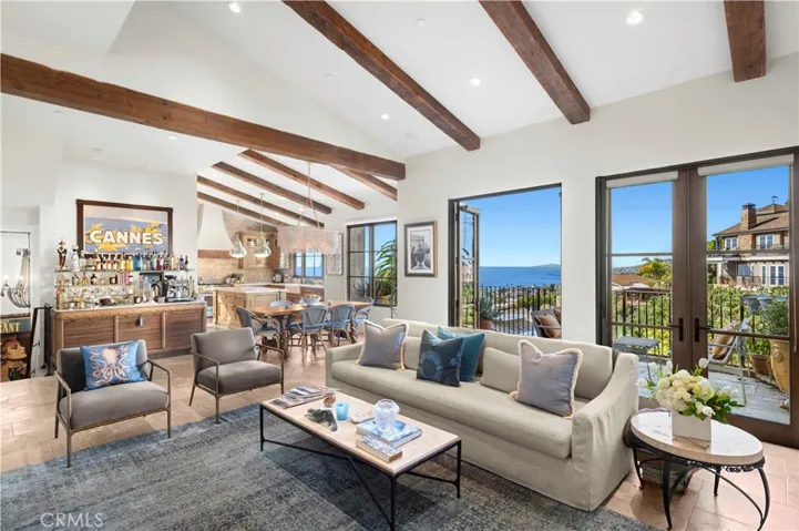 The home spans approximately 2,926 square feet and features three bedrooms and two-and-a-half baths, thoughtfully arranged within a generous, open floor plan.