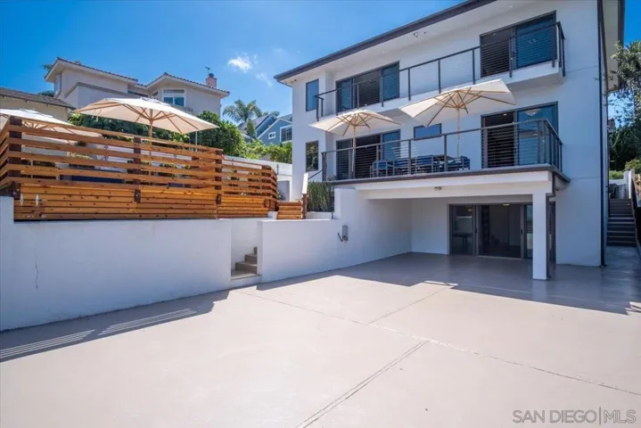 This patio is directly outside the bonus room, and is connected to the main deck via a small set of stairs.