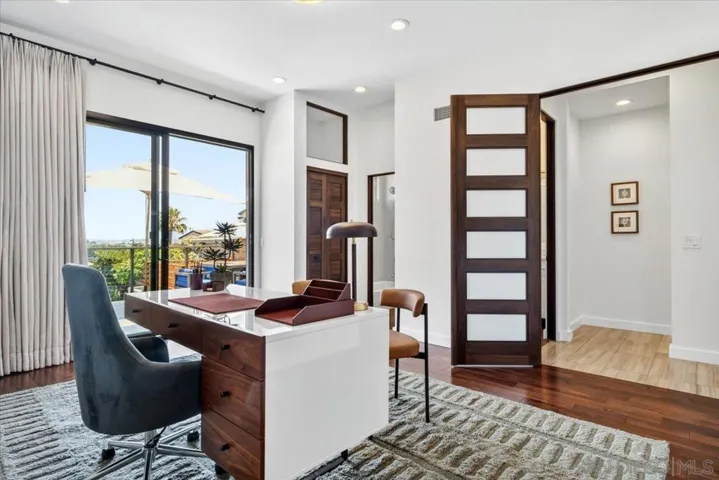 Bedroom #4 can easily be used as a home office.  It has an attached bathroom, which has a separate door to the common areas for guests.