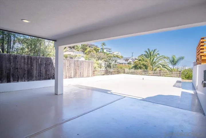 This patio is directly outside the bonus room, and is connected to the main deck via a small set of stairs.