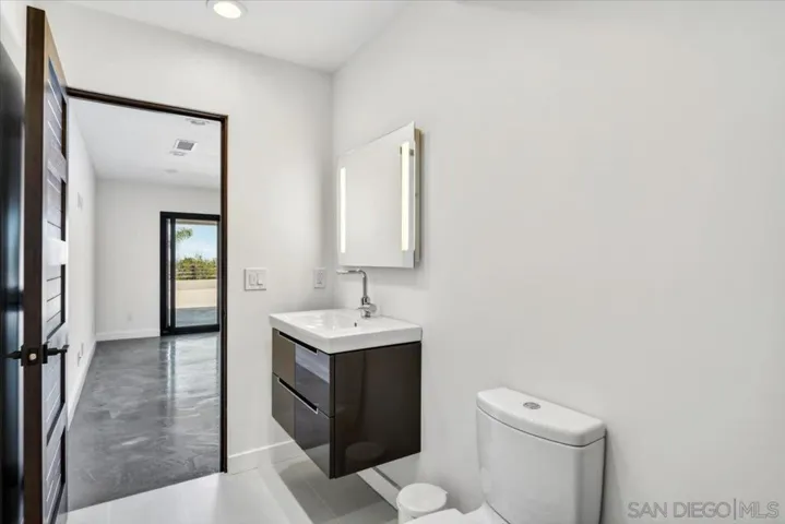 This full bathroom is directly attached to the bonus room.