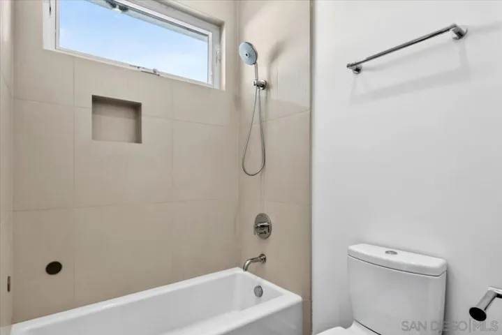 Bathroom attached to Bedroom #4.  Additional exterior door leads to common area.