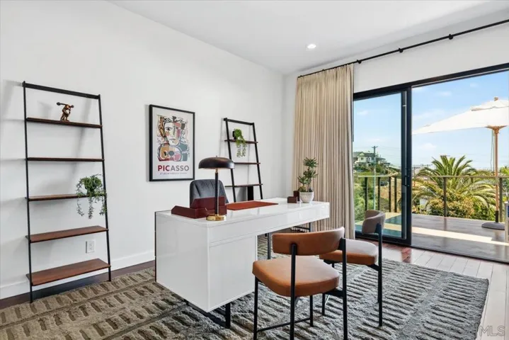 Bedroom #4 can easily be used as a home office.  It has an attached bathroom, which has a separate door to the common areas for guests.