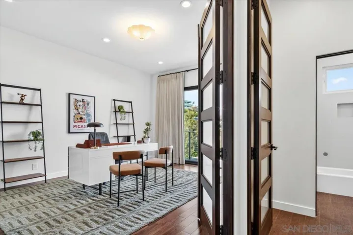 Bedroom #4 can easily be used as a home office.  It has an attached bathroom, which has a separate door to the common areas for guests.