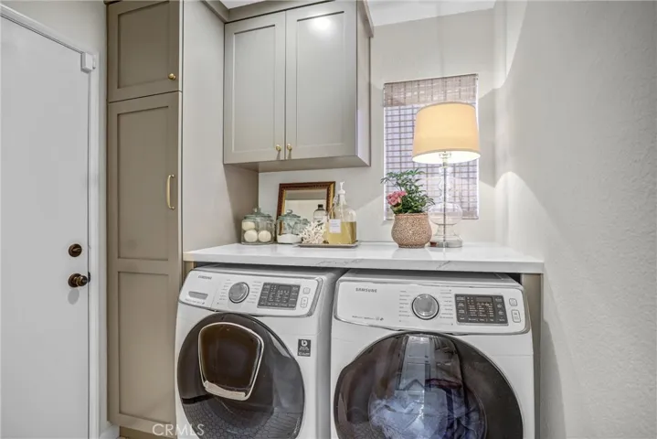 The laundry room is newly remodeled as well.