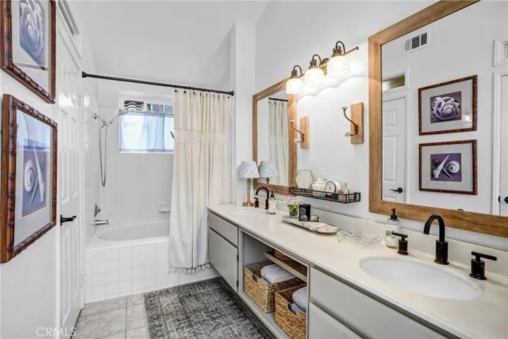The charm of this home is noticeable in every room, including the primary bathoom.