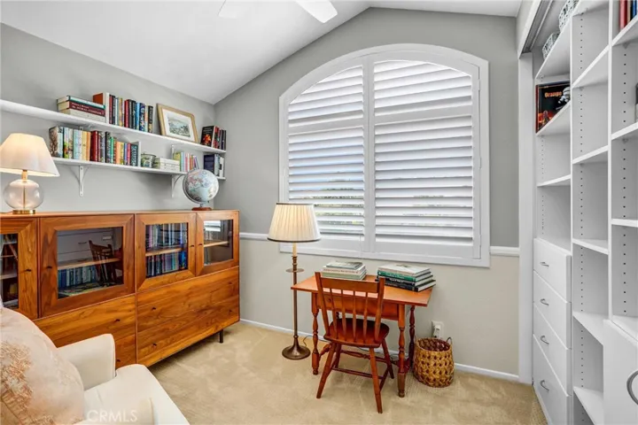 The front bedroom has vaulted ceilings and a ton of natural light.