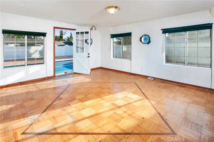 Filled with windows and opening directly to the backyard, the bonus room adds extra space for whatever comes next. It's equally suited for movie nights, hobbies, working from home, or simply having a place to spread out.