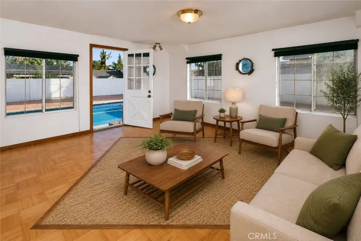 Filled with windows and opening directly to the backyard, the bonus room adds extra space for whatever comes next. It's equally suited for movie nights, hobbies, working from home, or simply having a place to spread out.  Photo is virtually staged.