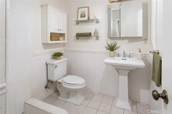 The primary private bath.  Photo is virtually staged.