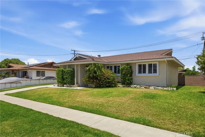 Beautifully upgraded and move-in ready charming home.   Nearly 1,200 square feet of living space - Plus a spacious enclosed patio adding around 170 square feet for a spacious family room (over 1,340 square feet of combined interior space).  Situated on a spacious 6,490 square foot lot,