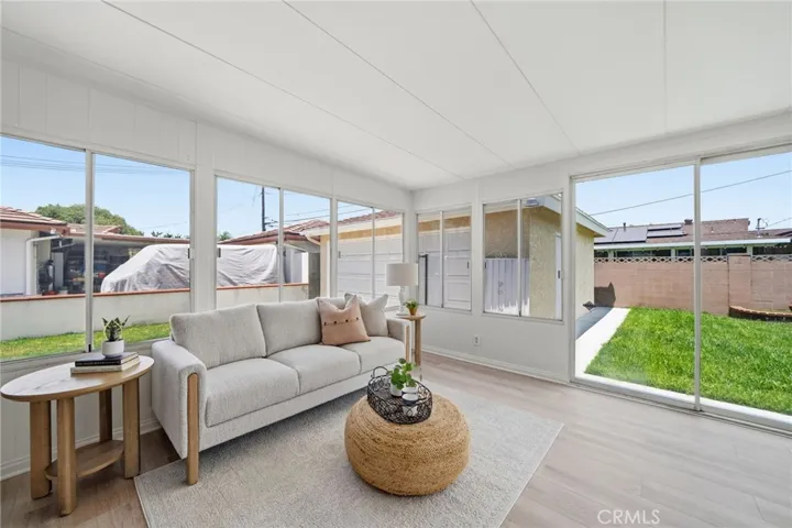 This charming home offers nearly 1,200 square feet of living space - Plus a spacious enclosed patio adding around 170 square feet for a spacious family room (over 1,340 square feet of combined interior space). The enclosed patio is a versatile bonus space and ideal as a family room, playroom or exercise room.  Large windows in this spacious bonus area create a bright indoor-outdoor feel with views overlooking the expansive backyard.