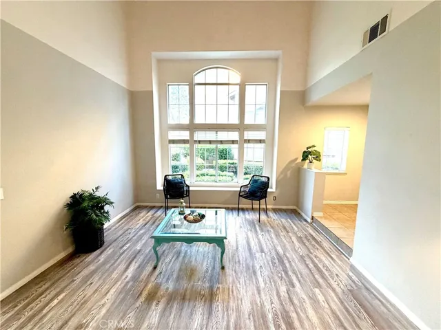 Entry Living Room with Large Cathedral Style window