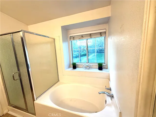 Primary Bathroom has soaking tub and separate​​‌​​​​‌​​‌‌​​‌​​​‌‌​​​‌​​‌‌​​‌‌​​‌‌​​​​ Shower