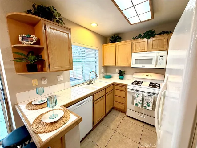 Kitchen includes Refrigerator, Stove, Microwave, New Dishwasher