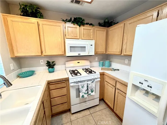 Kitchen includes Refrigerator, Stove, Microwave, New Dishwasher